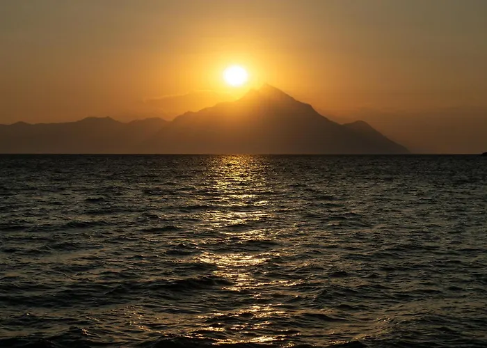 Aegean sea at golden hour with view of Mount Athos from Akasti Slow Living